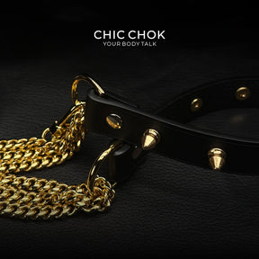 Punk-style choker featuring spikes and leather strap for a statement accessory gold