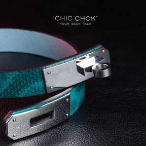 chicchok PoisonIvy Collar CHICCHOK green textured leather choker with a metallic silver locking clasp and light blue inner lining, showcasing luxurious craftsmanship and modern edgy design for bold fashion statements