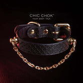 chicchok [Silvana] black snake pattern bracelet, paired with luxurious gold chain and hardware details, noble and individual design style, modern fashion accessories.
