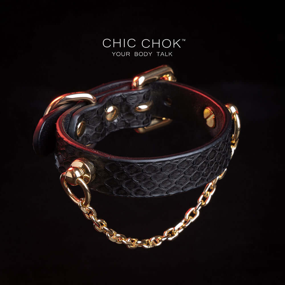 chicchok [Silvana] black snake pattern bracelet, paired with luxurious gold chain and hardware details, noble and individual design style, modern fashion accessories.
