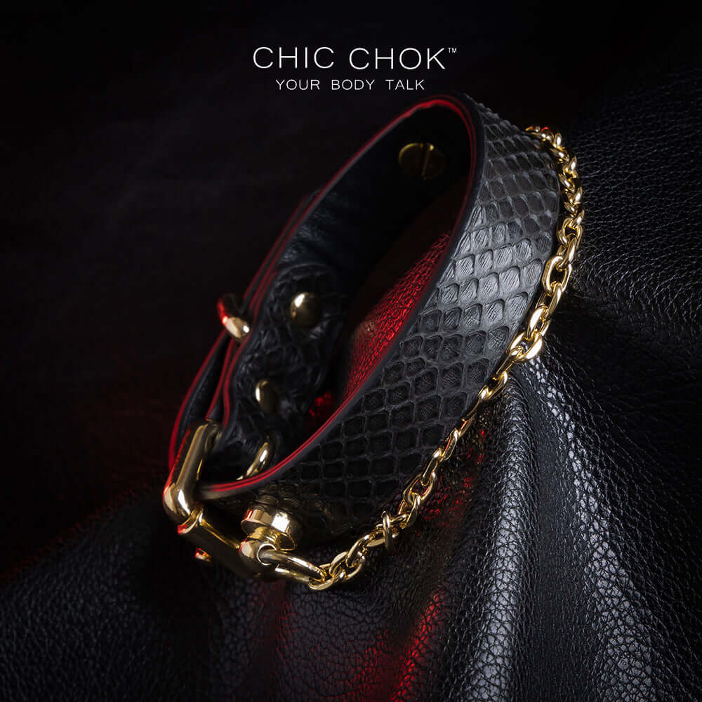 chicchok [Silvana] black snake pattern bracelet, paired with luxurious gold chain and hardware details, noble and individual design style, modern fashion accessories.